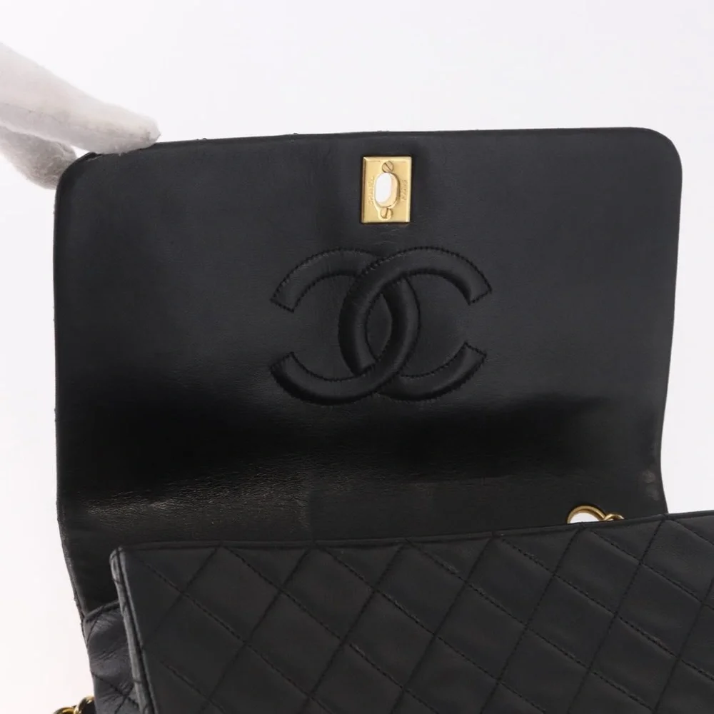 CHANEL Black Quilted Leather Shoulder Bag with Gold Hardware